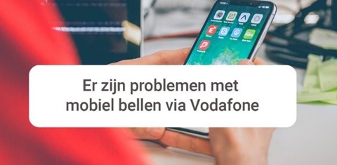 mobiele telefoon met tekst Er zijn problemen met mobiel bellen via Vodafone 
